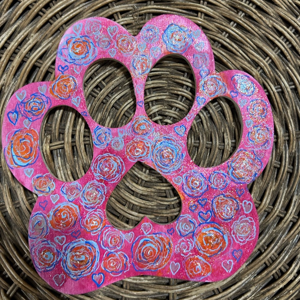 Hand painted wooden paw sign